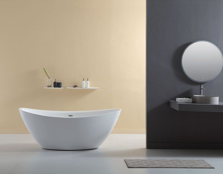 Bathroom with freestanding bath, vanity and mirror